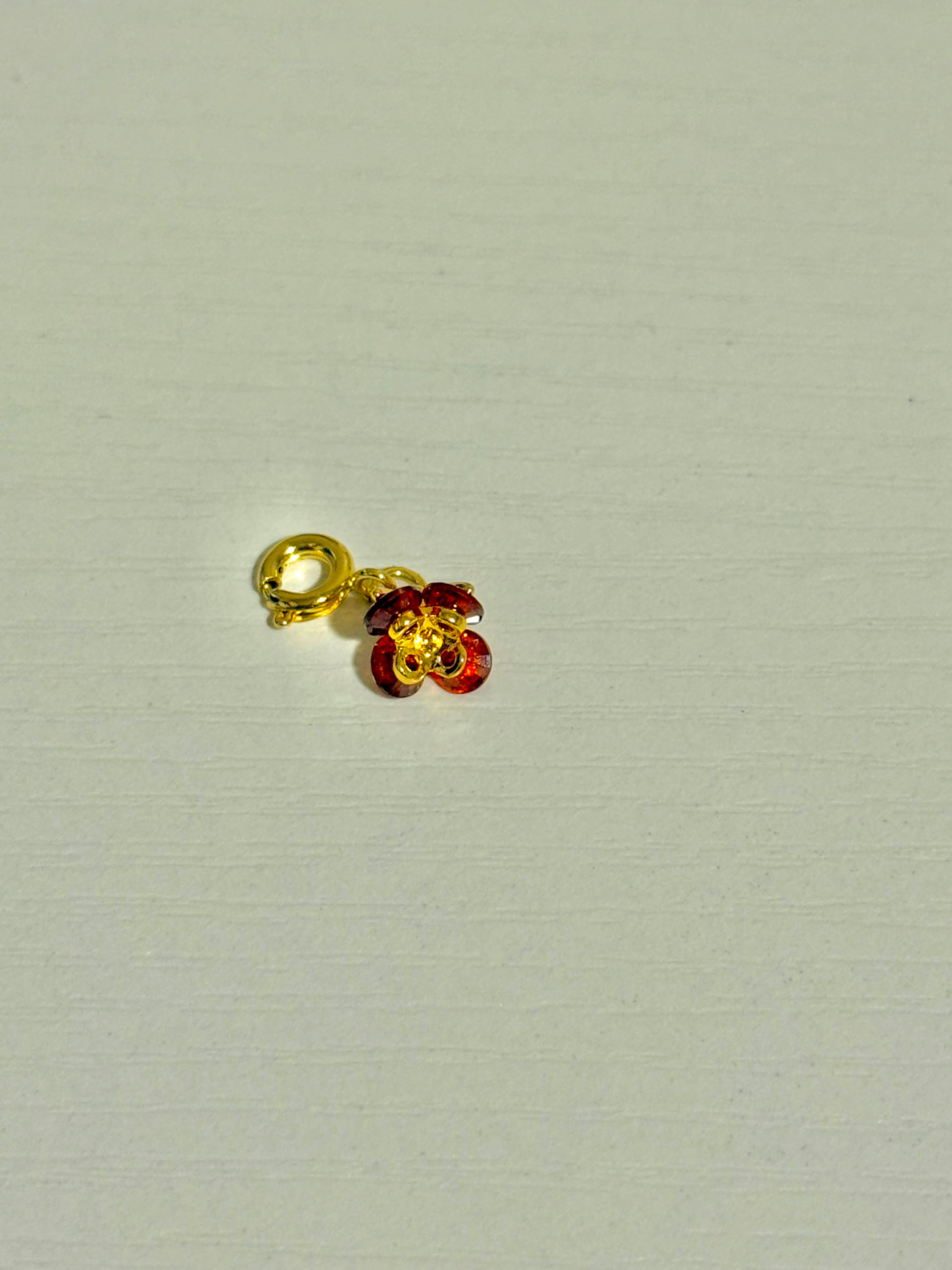 Petite Fleur | Small Red & Gold Flower Charm